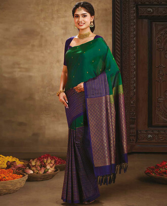 Green+%26+blue+vasundhara+silk+mix+saree+with+zari+stripes+%26+buttas%2C+contrast+pallu+of+jaal+designs