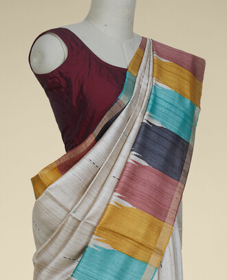 Cream+tusser+silk+saree+features+unique+buttas+%26+multi-color+temple+designs+