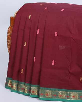 Maroon+Chettinad+cotton+saree+with+all-over+buttas%2C+contrast+border+of+peacock+designs+%26+pallu+of+stripes