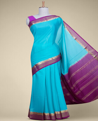Blue+plain+design+mysore+silk+saree%2C+contrast+zari+border+of+paisley+designs+%26+pallu+of+zari+stripes