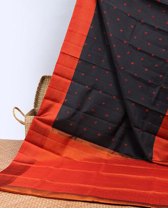 Black+silk+saree+with+chakram+buttas%2C+contrast+border+of+traditional+designs+%26+jaal+pallu