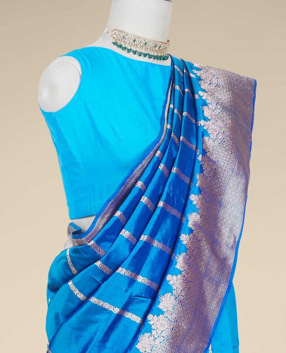 Light blue vasundhara silk mix saree with zari buttas, zari traditional  border & contrast pallu of intricate designs